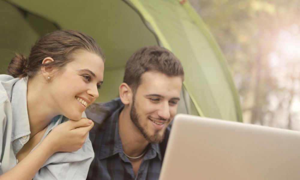 Couple researching how to get married in Abu Dhabi from home before applying