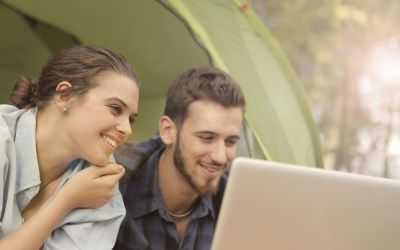 Couple researching how to get married in Abu Dhabi from home before applying